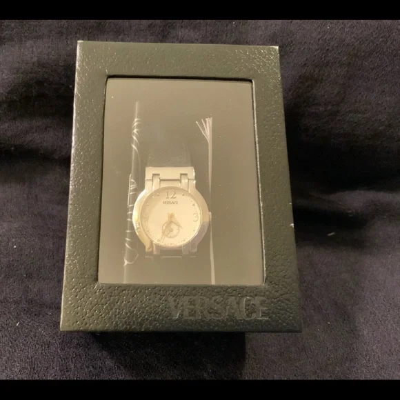 original VERSACE round silver face with black leather strap